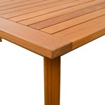 Mayaguana Teak Dining Table in Natural in a styled room