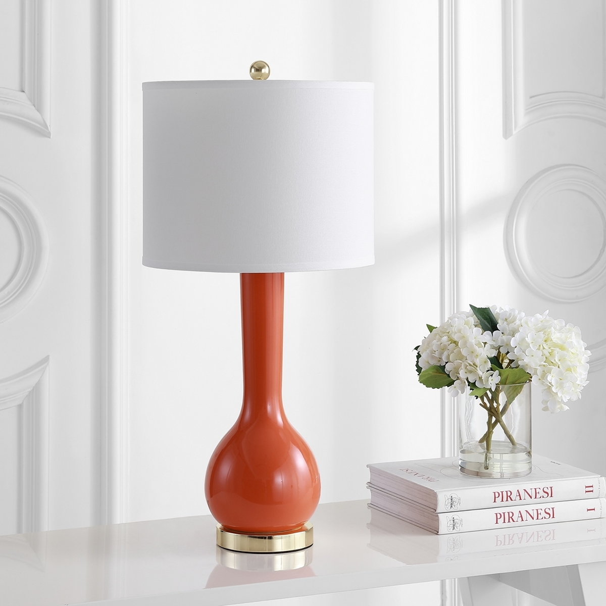Lit4091d Set2 Table Lamps Lighting By Safavieh Shown In Blood Orange With Brushed Gold Base And Neck This Artful Lamp Is Complemented A Contemporary White Cotton Drum Shade