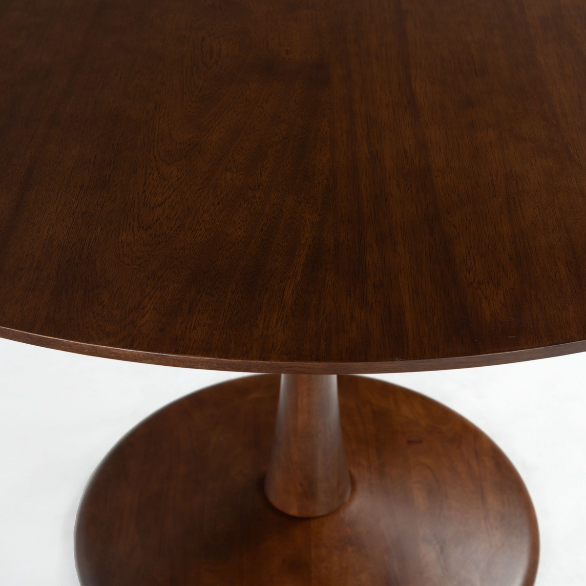 Lisette Round Dining Table in Walnut in a styled room