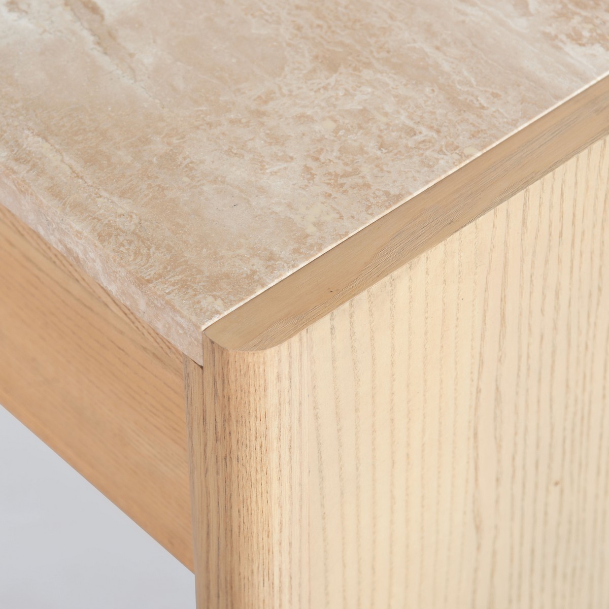 Bellarose Traver Console Table in Natural / Travertine in a styled room