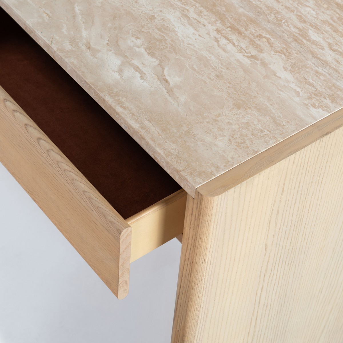 Bellarose Traver Console Table in Natural / Travertine in a styled room